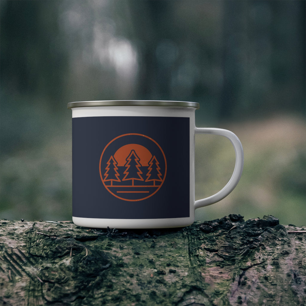 Coffee Tastes Better Outside enamel camp mug on a mossy log in the woods