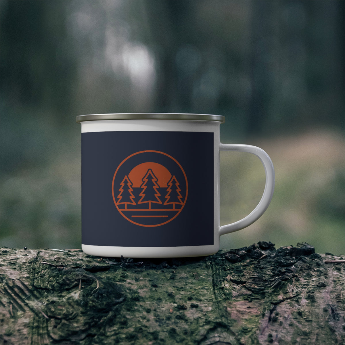 Coffee Tastes Better Outside enamel camp mug on a mossy log in the woods