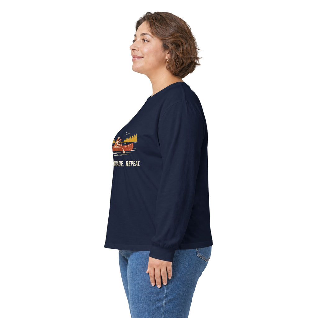 Model wearing the Navy Paddle Portage Long Sleeve Tee, side view