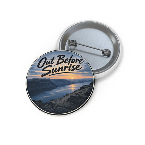 Out Before Sunrise pin button with a river canyon at sunrise, shown front and back