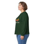 Model wearing the Forest Green Paddle Portage Long Sleeve Tee, side view