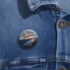 Out Before Sunrise pin button worn on a denim jacket