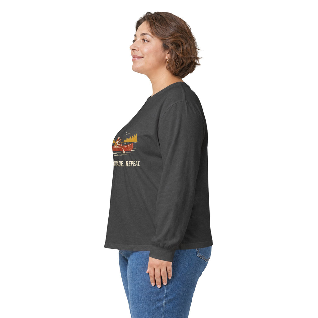 Model wearing the Dark Heather Paddle Portage Long Sleeve Tee, side view