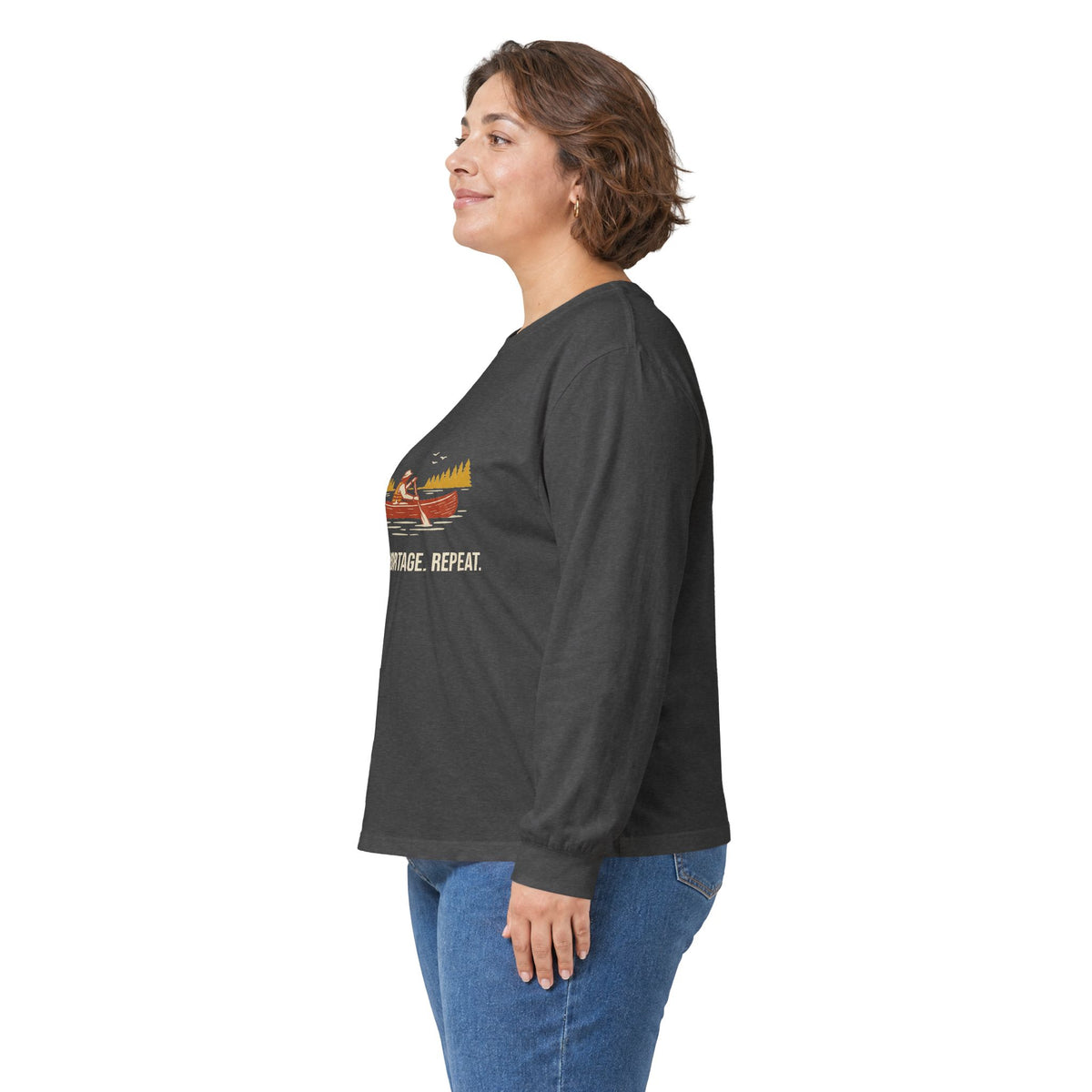 Model wearing the Dark Heather Paddle Portage Long Sleeve Tee, side view