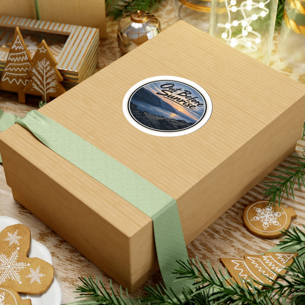 Out Before Sunrise sticker on a kraft gift box